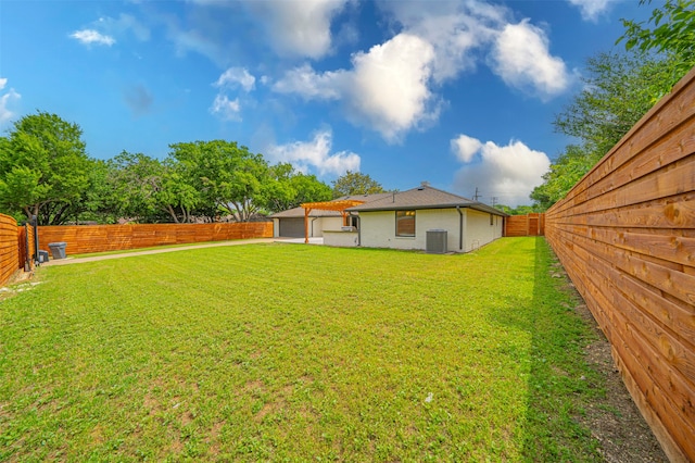 view of yard featuring central AC