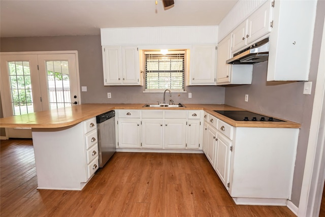 kitchen with black electric cooktop, under cabinet range hood, a peninsula, a sink, and dishwasher