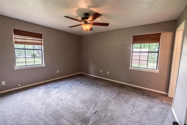 carpeted empty room with ceiling fan