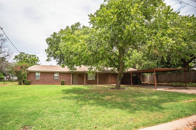 view of yard featuring a carport