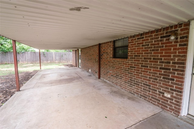 view of patio / terrace featuring fence