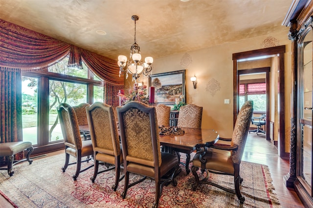 dining area featuring a chandelier