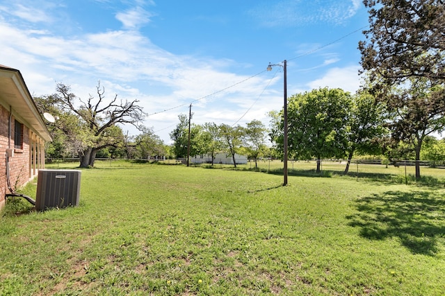 view of yard featuring central AC unit