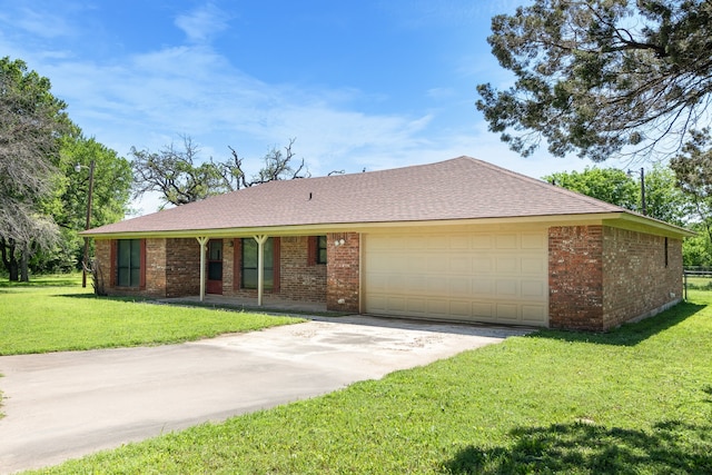 ranch-style house with a garage and a front lawn