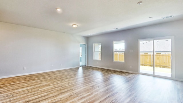 empty room featuring light hardwood / wood-style floors