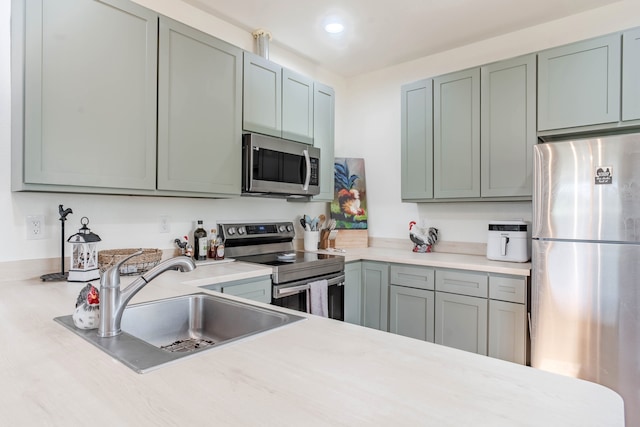 kitchen with sink and stainless steel appliances