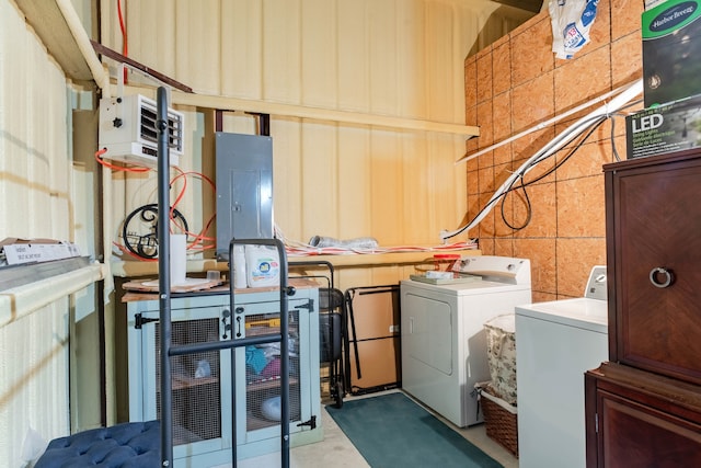 washroom with washing machine and clothes dryer