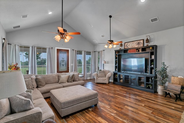 living room featuring high vaulted ceiling, dark hardwood / wood-style floors, and ceiling fan