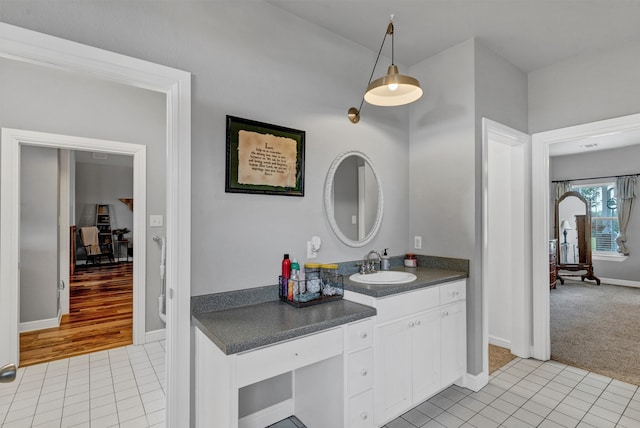 bathroom featuring vanity and tile flooring