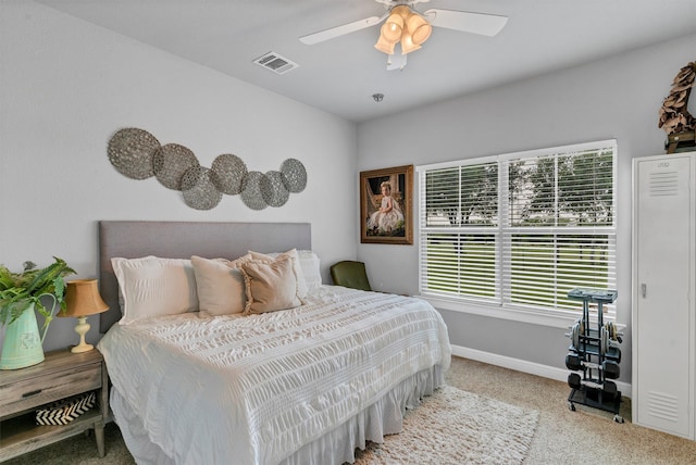 carpeted bedroom with ceiling fan