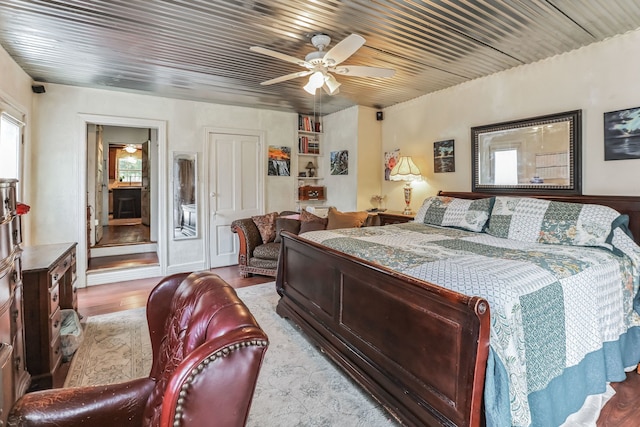 bedroom featuring wooden ceiling, ceiling fan, and hardwood / wood-style floors