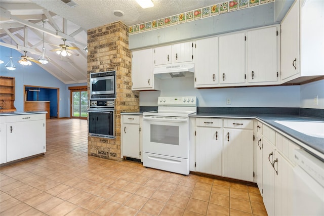 kitchen featuring white appliances, a ceiling fan, dark countertops, under cabinet range hood, and white cabinetry