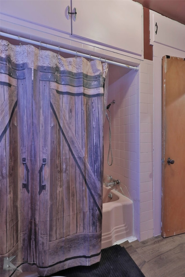 bathroom featuring shower / bath combination with curtain