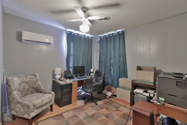 home office with a wall mounted AC, ceiling fan, and wooden walls