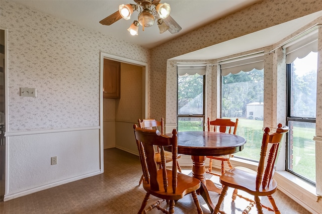 dining space with ceiling fan