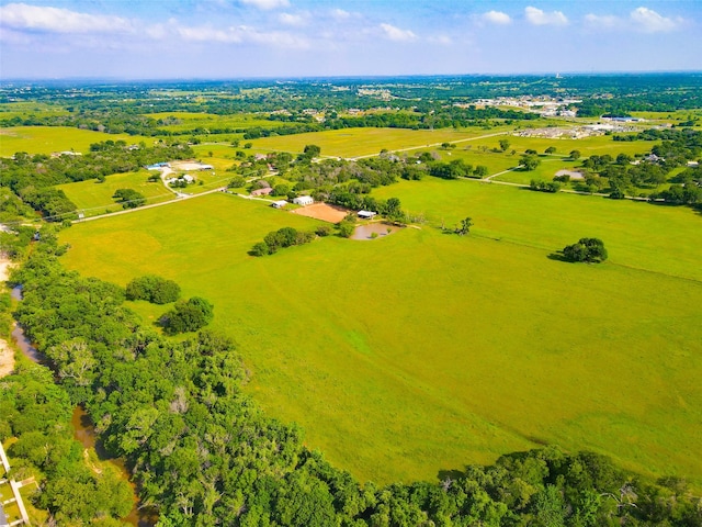 birds eye view of property featuring a rural view