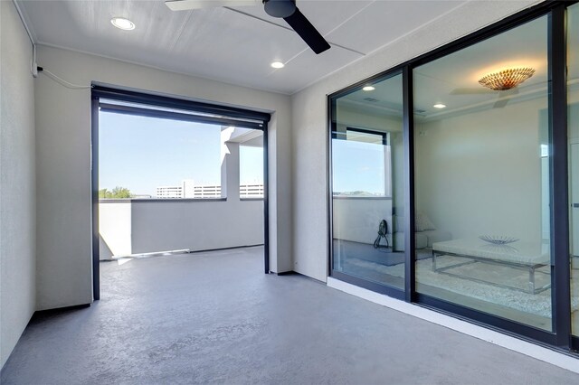 full bathroom with tile floors, tiled shower / bath combo, toilet, and vanity