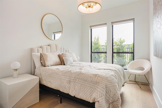 bedroom featuring hardwood / wood-style flooring