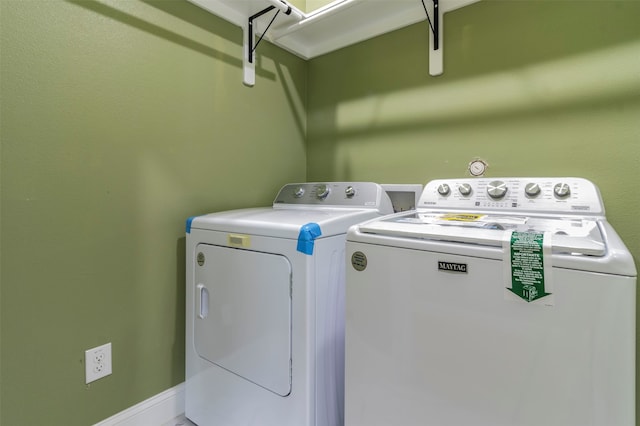 washroom featuring washing machine and dryer and washer hookup