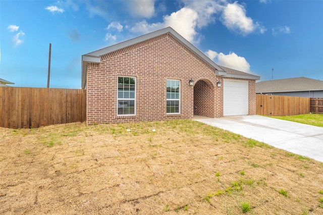 view of front of home with a garage