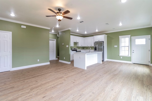 kitchen with white cabinetry, light hardwood / wood-style floors, ceiling fan, and a center island with sink