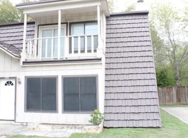 view of property exterior with a balcony