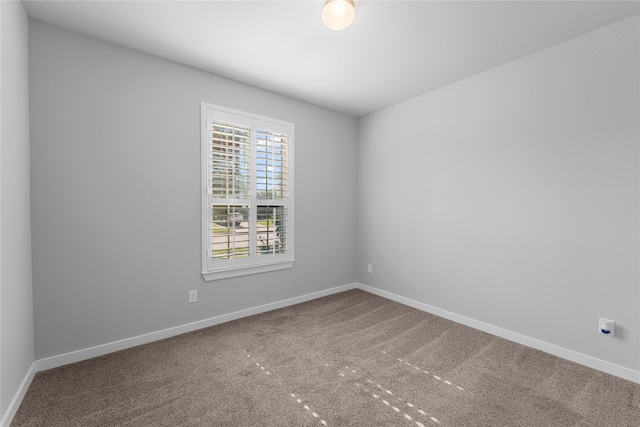 spare room with carpet flooring