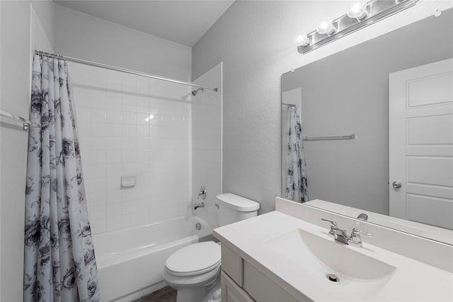 full bathroom with shower / tub combo with curtain, vanity, and toilet