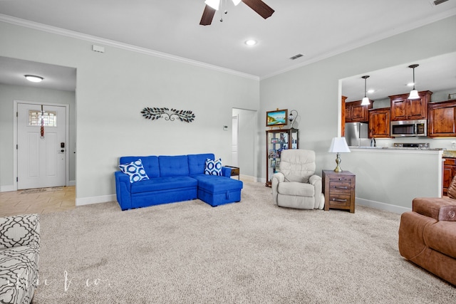 living room featuring light colored carpet, ceiling fan, and crown molding