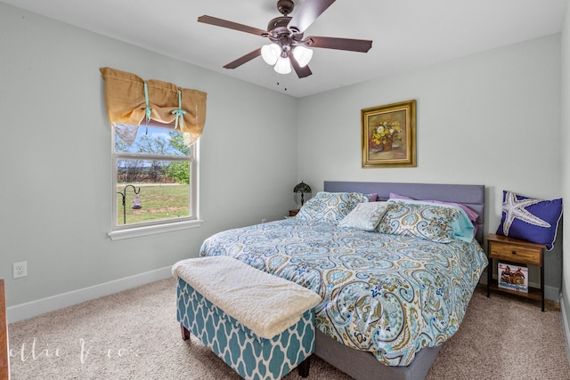 bedroom featuring ceiling fan and carpet floors