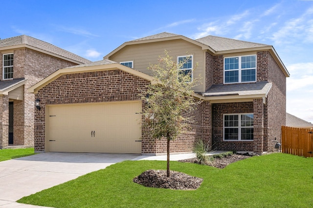 view of front of home with a garage and a front lawn