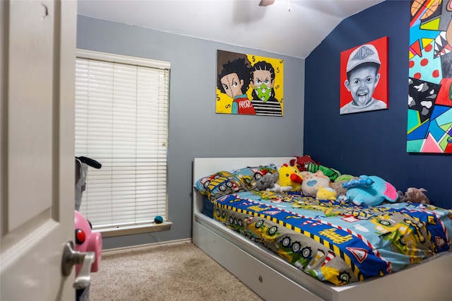 carpeted bedroom with lofted ceiling and ceiling fan