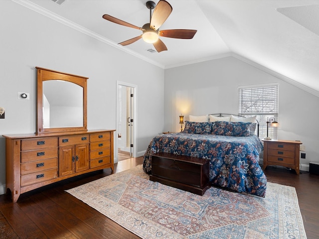 bedroom featuring lofted ceiling, ceiling fan, dark hardwood / wood-style floors, and ornamental molding