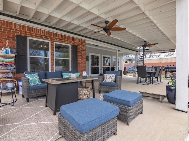 view of patio with ceiling fan and an outdoor hangout area