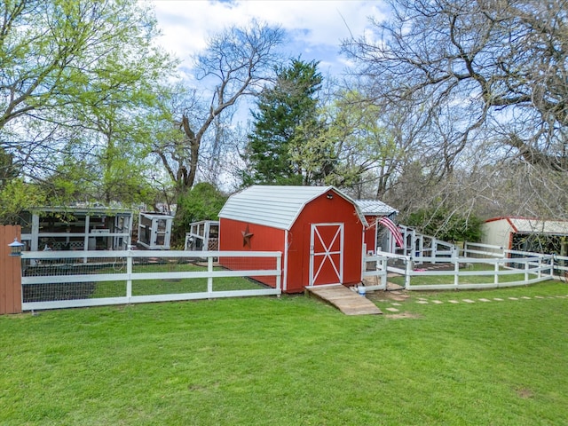 view of outbuilding with a lawn