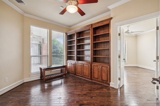 interior space with plenty of natural light, ceiling fan, ornamental molding, and dark wood-type flooring