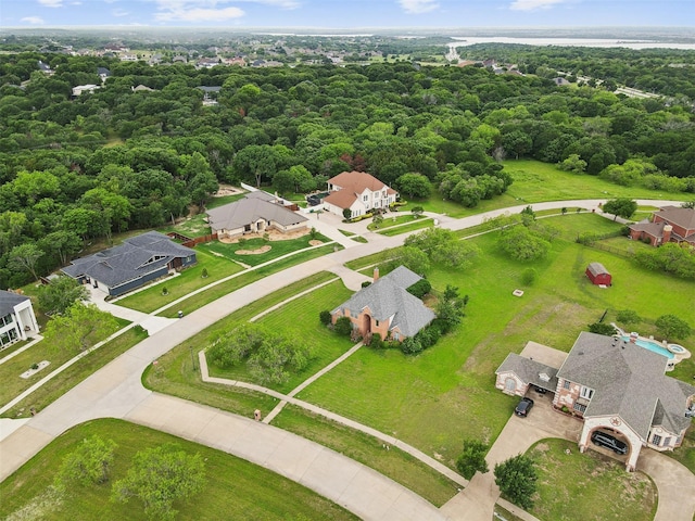 birds eye view of property with a residential view