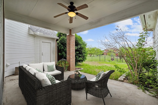 view of patio with outdoor lounge area and ceiling fan