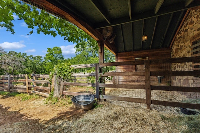 view of horse barn featuring an outdoor structure