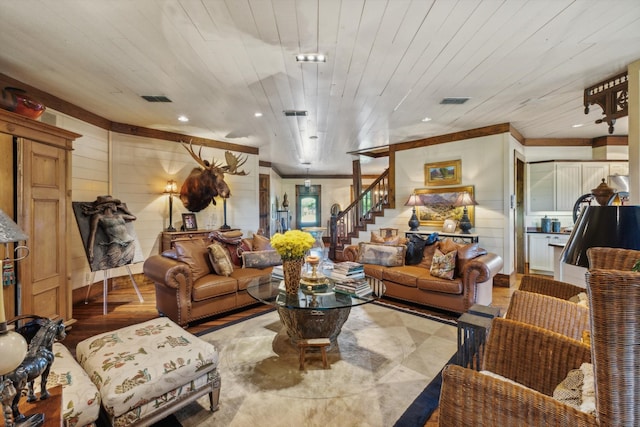 living room featuring wood-type flooring, wooden ceiling, and ornamental molding