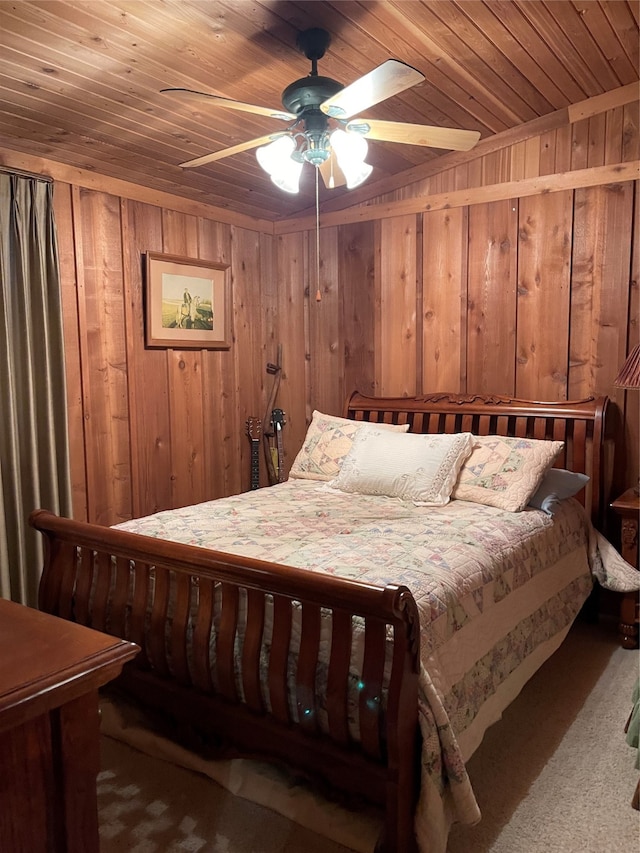 bedroom with wooden walls, ceiling fan, wooden ceiling, and carpet flooring