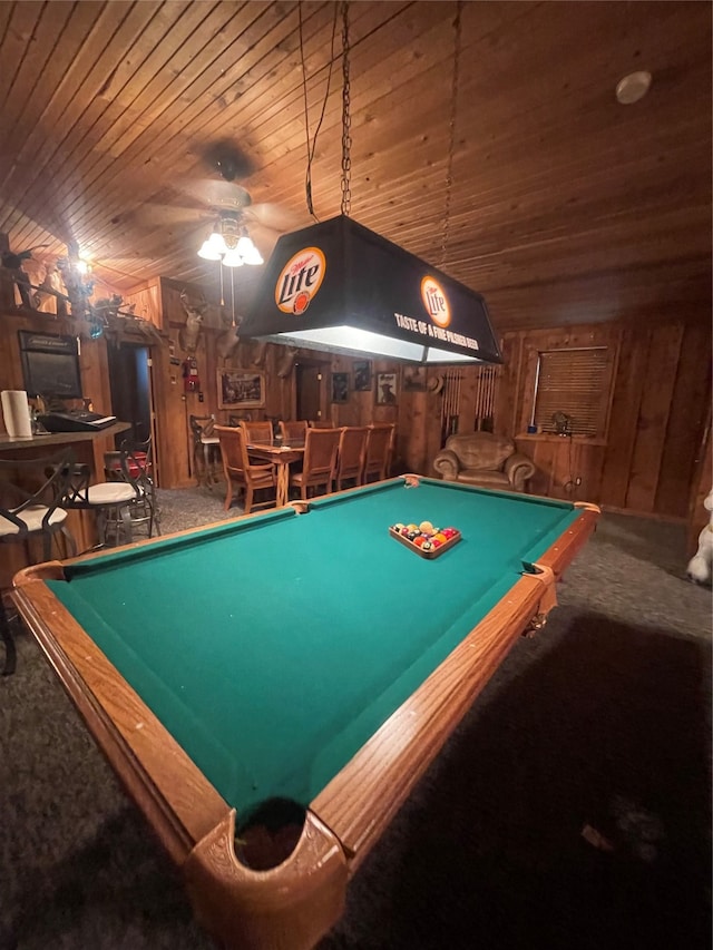 playroom with wooden walls, ceiling fan, billiards, and bar