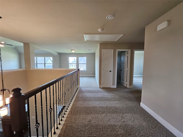 corridor featuring carpet flooring