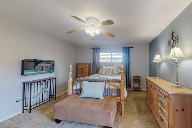 bedroom with light carpet and ceiling fan