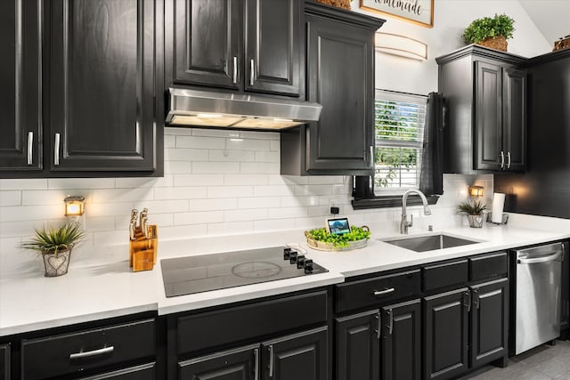 kitchen with backsplash, black electric cooktop, dishwasher, and sink