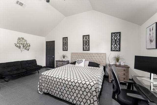 bedroom featuring lofted ceiling