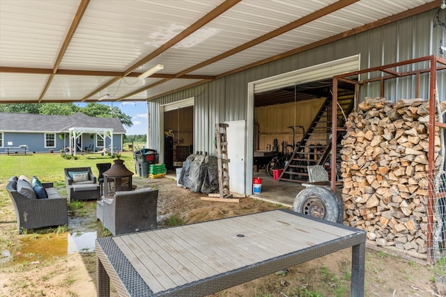 view of patio featuring an outdoor structure