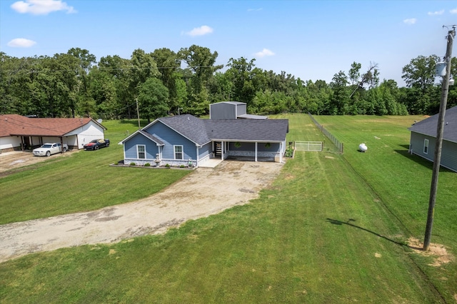 view of front of property featuring a garage and a front yard