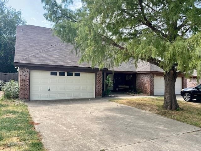 ranch-style home with a garage