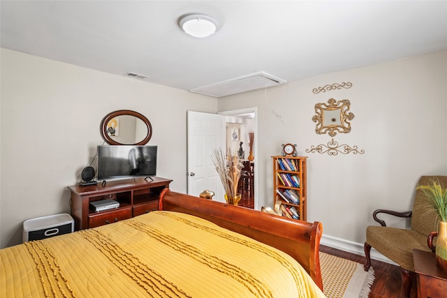 bedroom featuring hardwood / wood-style floors